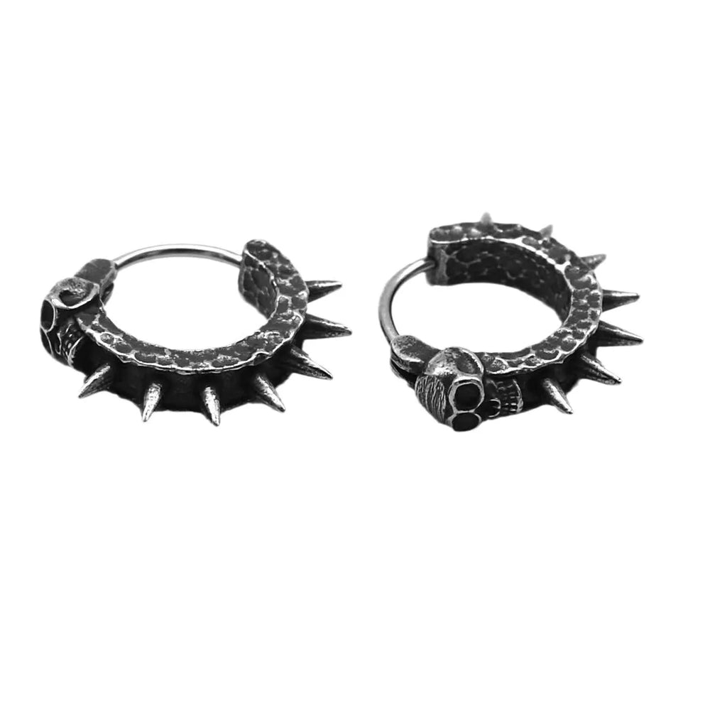 Geometric black motorcycle earrings with copper plastic punk detailing on alloy backing