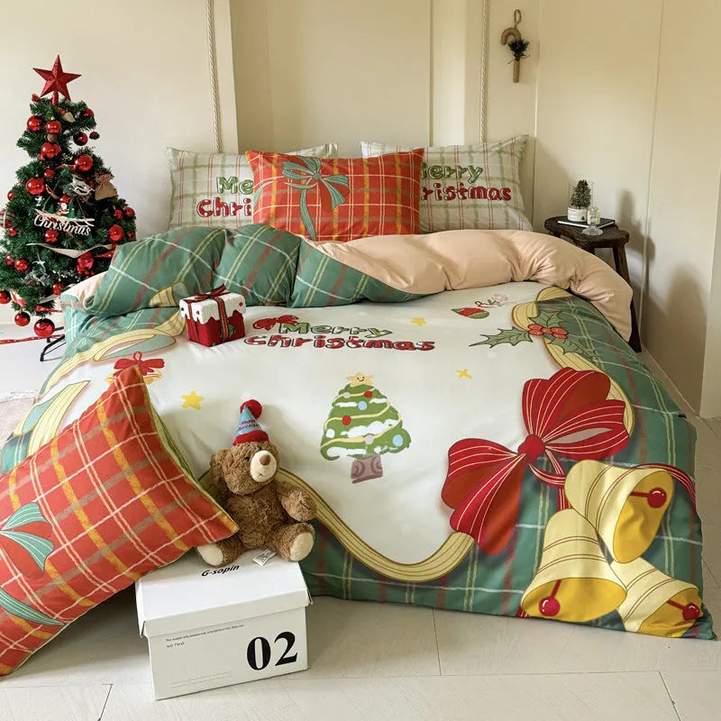 Cartoon printed super soft washed cotton chemical fibre four-piece bedding set on a bed.