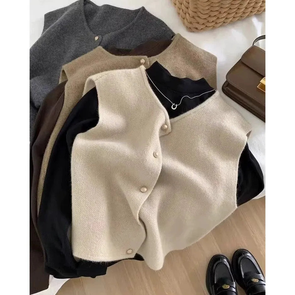 Women's grey V-neck polyester pullover vest with half-length sleeves laid flat