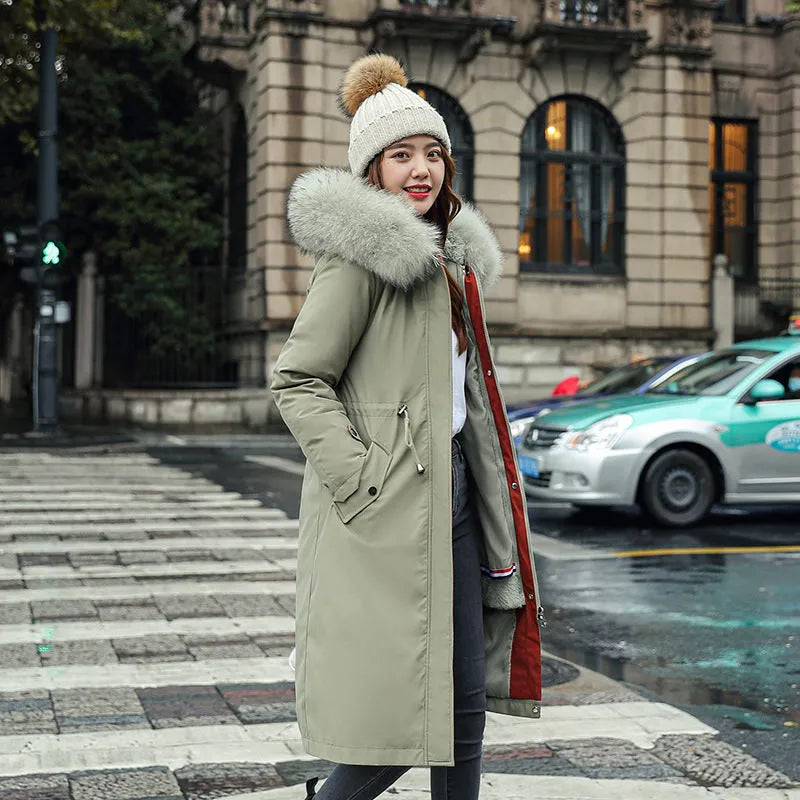 Women's long white cotton-padded fleece trench coat with down cotton filler, shown in elegant style.
