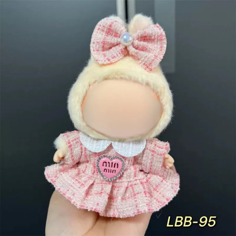 Plastic doll costume for a 17cm tall vinyl fashion figurine on a white background.