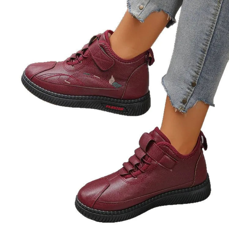 Women's black and red velvet cotton slippers with rubber soles showing hollow out design