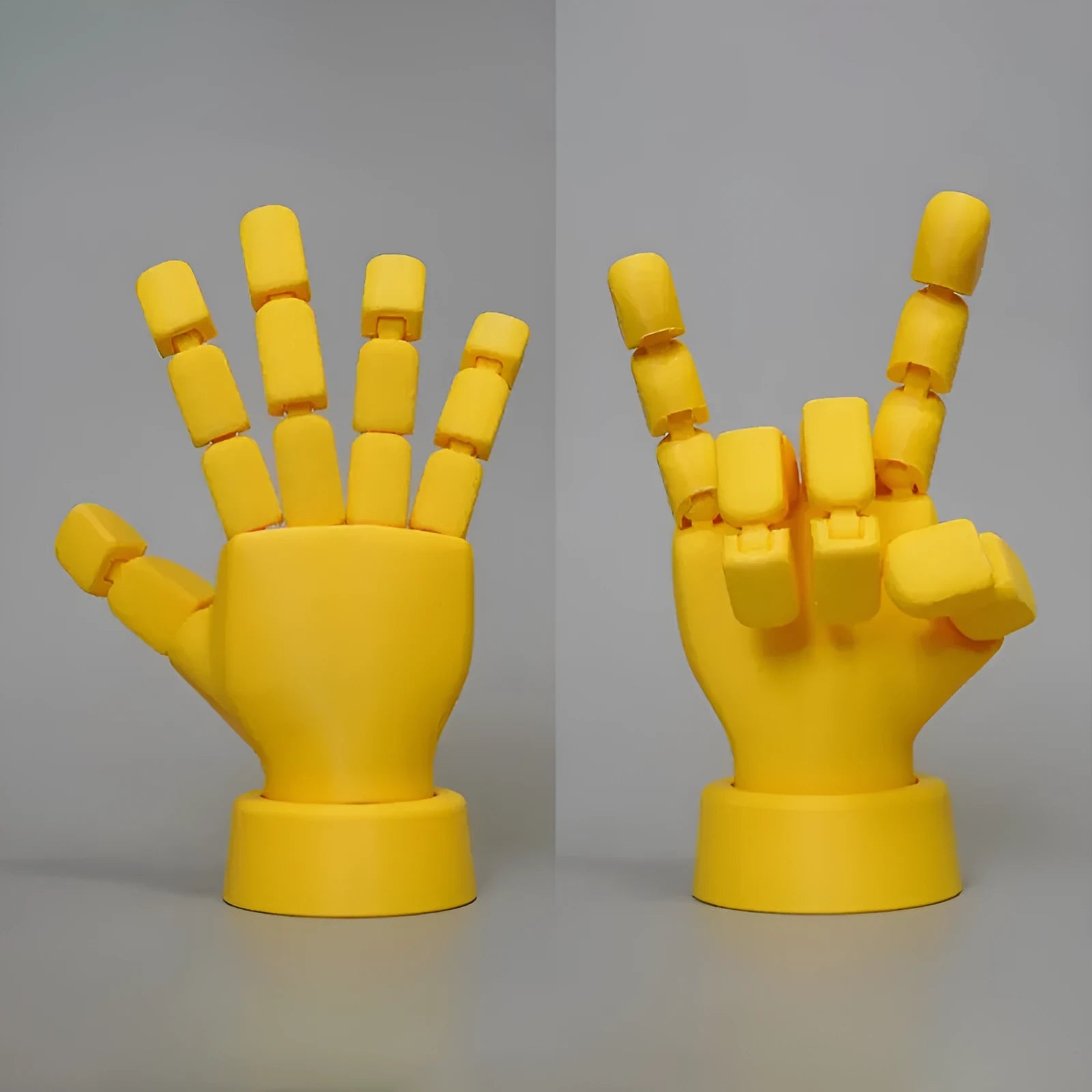 Yellow PLA plastic movable joint hand prop ornament with articulated fingers.