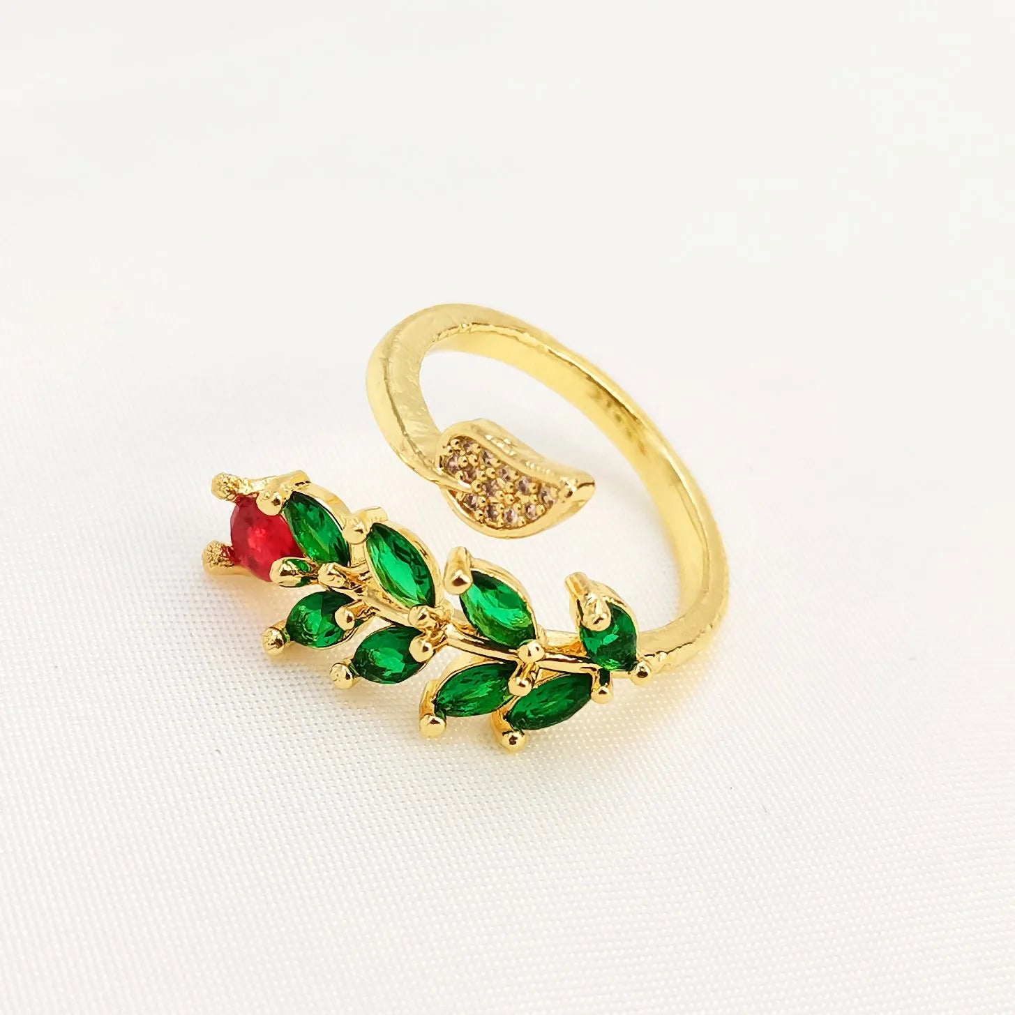 Copper geometric open ring with detailed leaf pattern and gold zircon accents