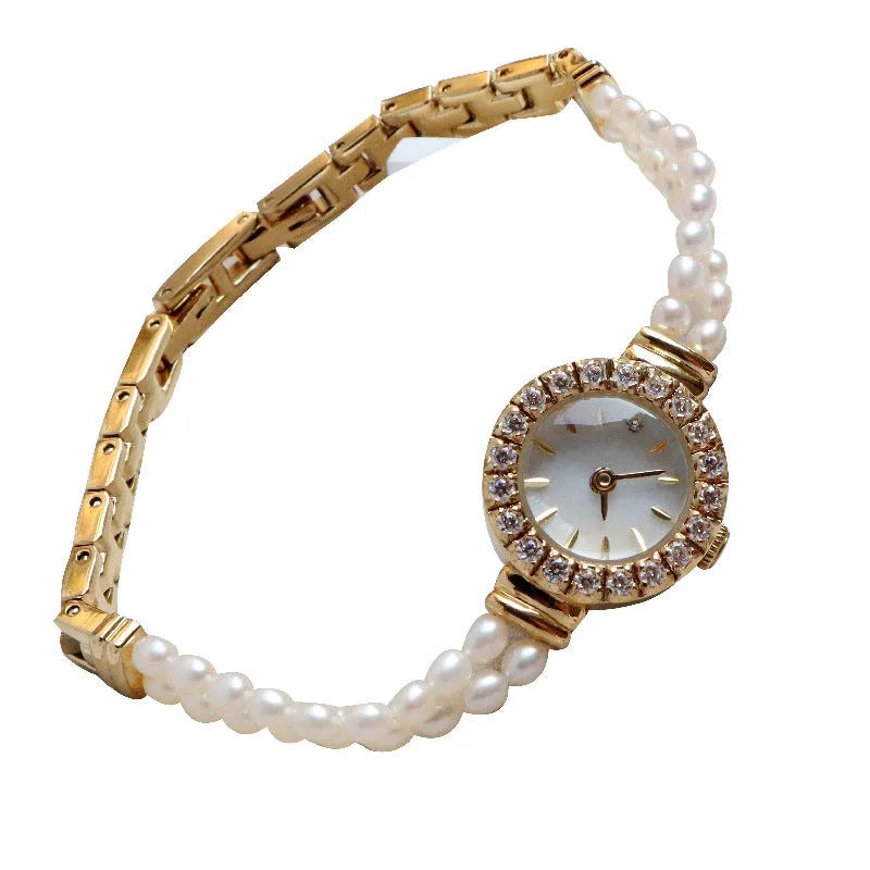 Women's light gold bracelet watch with natural freshwater pearls and round 18mm dial