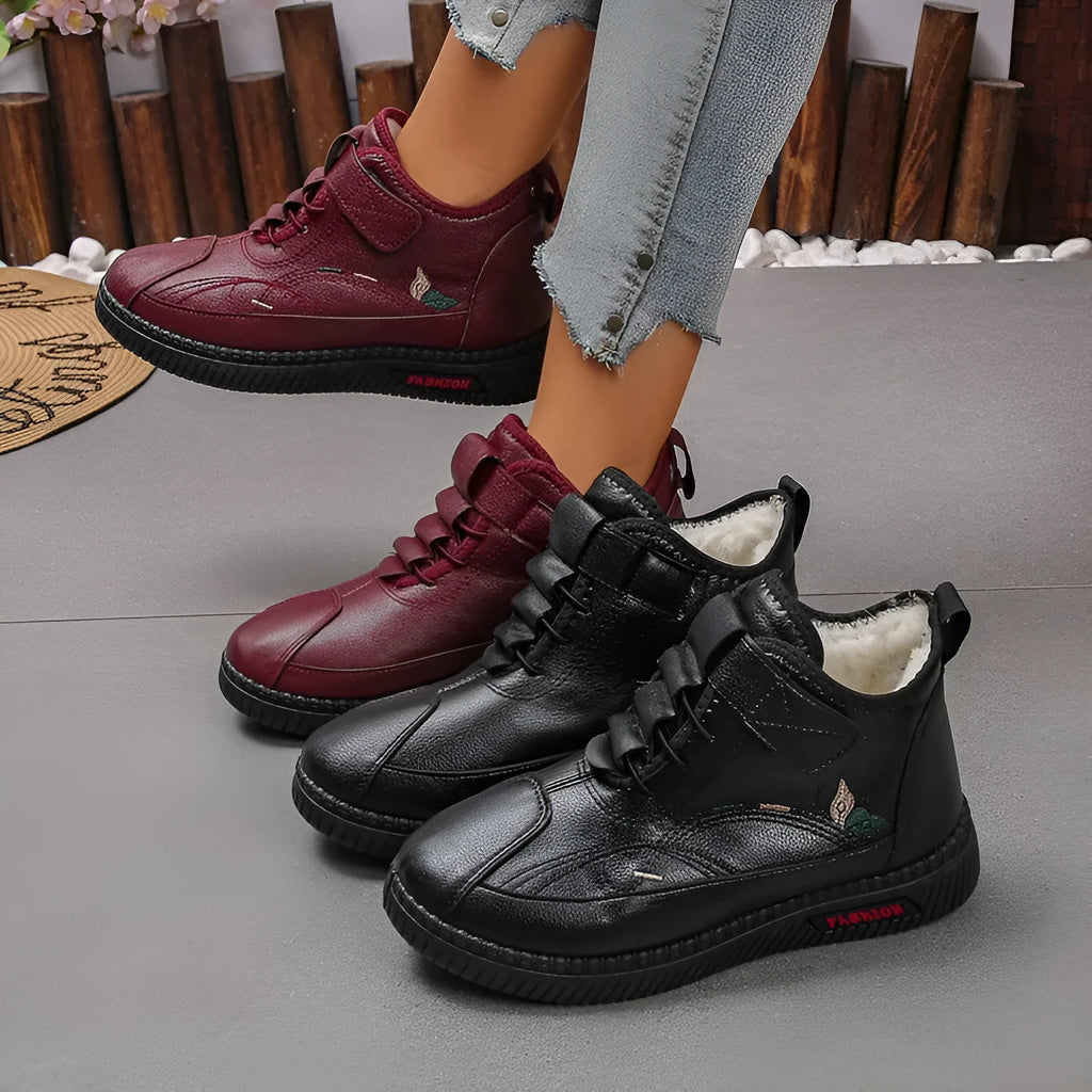 Women's black and red velvet cotton slippers with rubber soles showing hollow out design