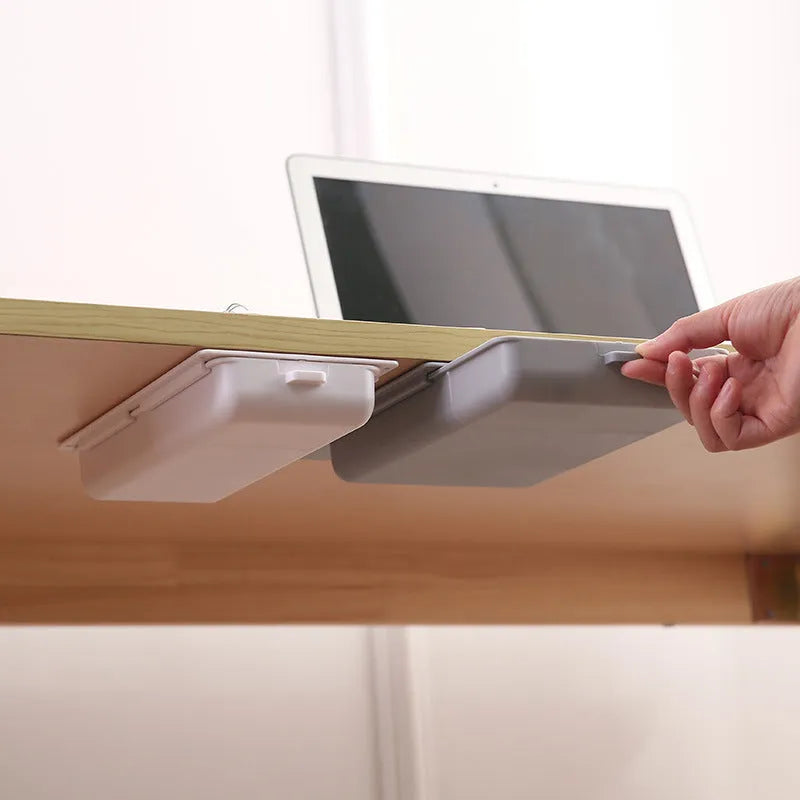 Adhesive plastic storage drawer with lid and internal grid divider for under-desk organisation