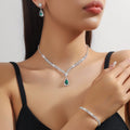 Women's claw chain necklace and earrings set with water drop rhinestones in blue colour option