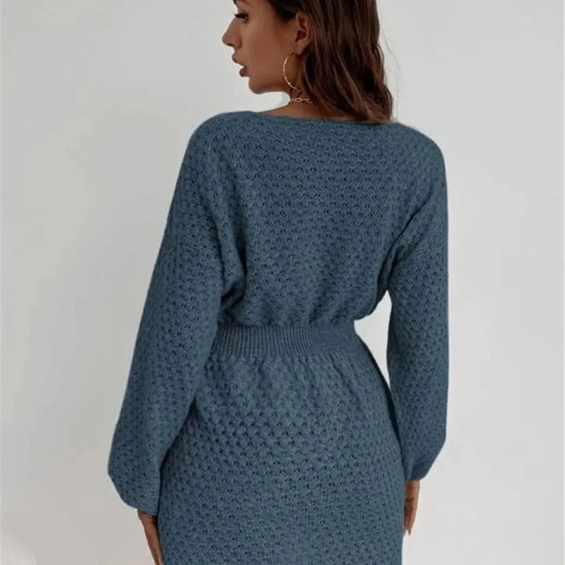 Blue women's knitted dress with hand-crocheted flower decoration and fitted waist design