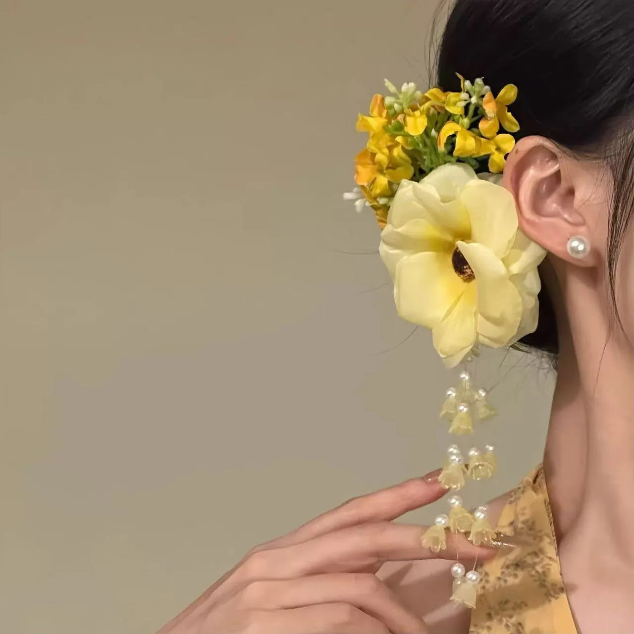 Handmade floral tassel hair clip with pearl detailing in purple or yellow colour option
