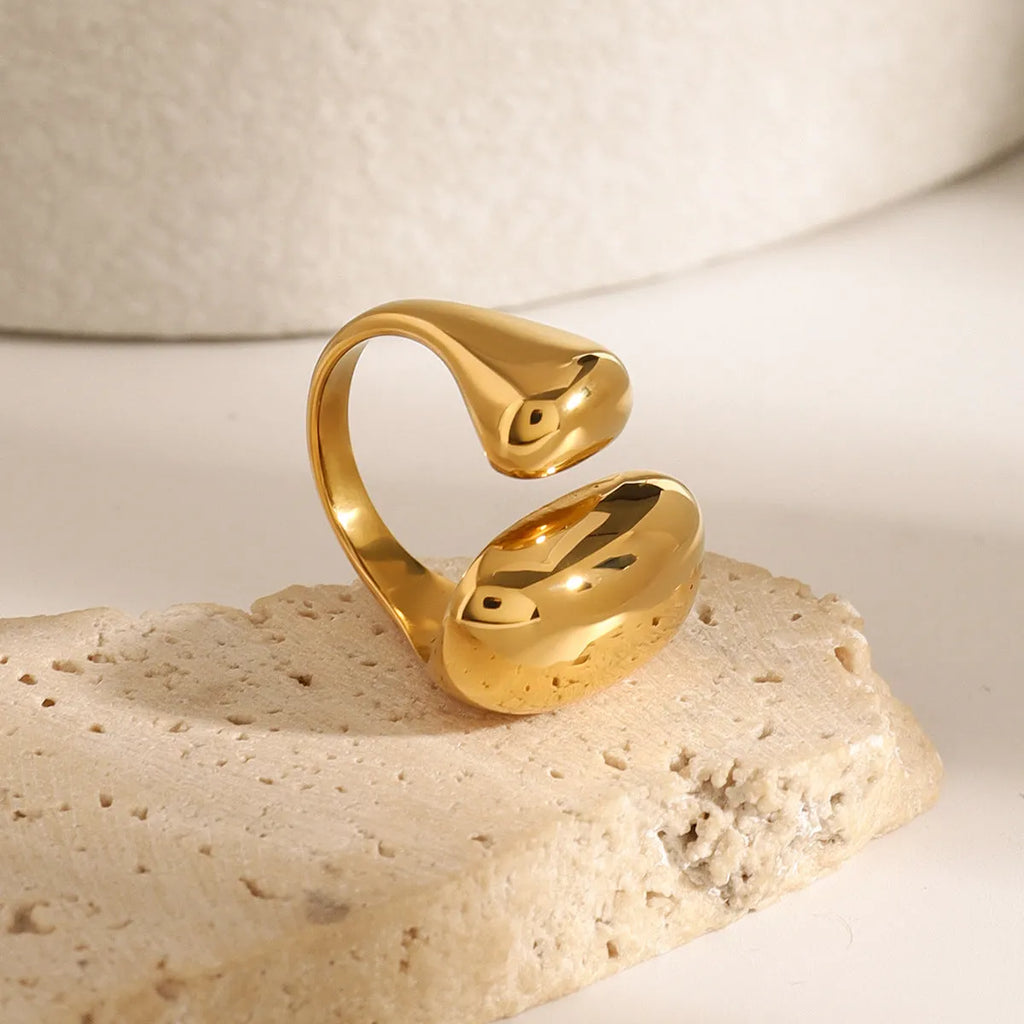 Women's exaggerated open geometric ring in stainless steel with electroplated finish.