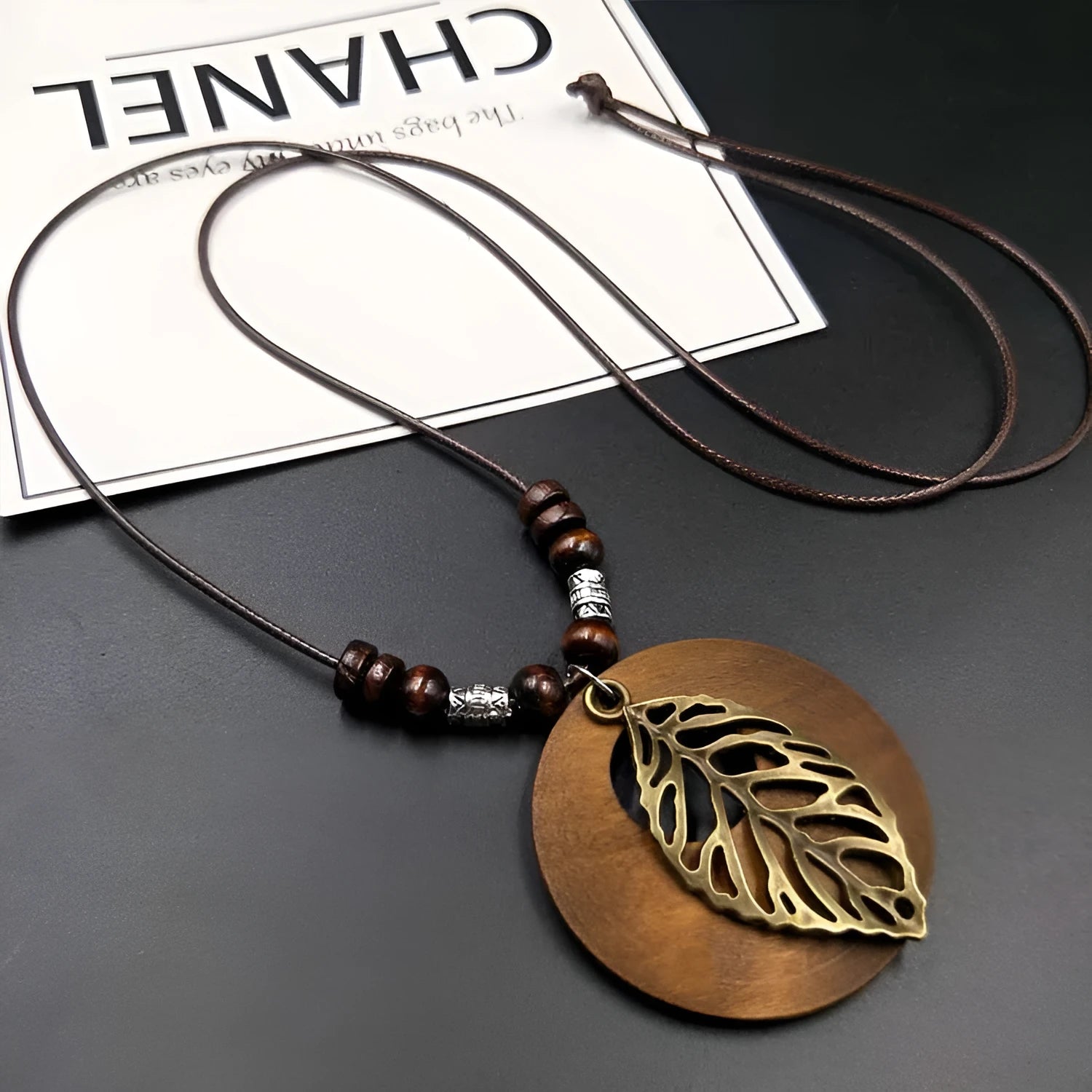Wooden leaf necklace on adjustable wax cord chain with electroplated alloy elements