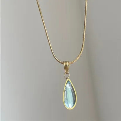 Retro water drop necklace with blue gemstone pendant on a titanium steel snake bone chain.