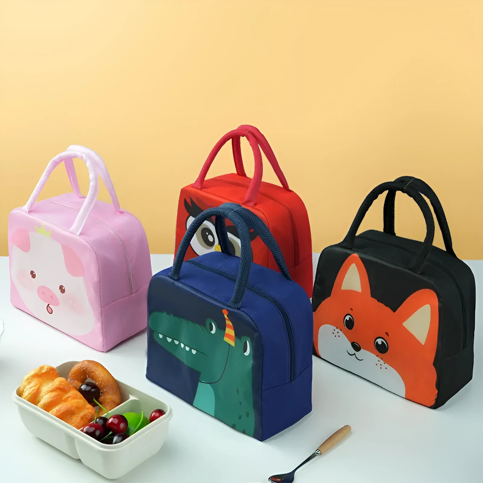 Cartoon insulated lunch box bag with thick aluminium foil lining and Oxford cloth exterior in one of seven character designs.