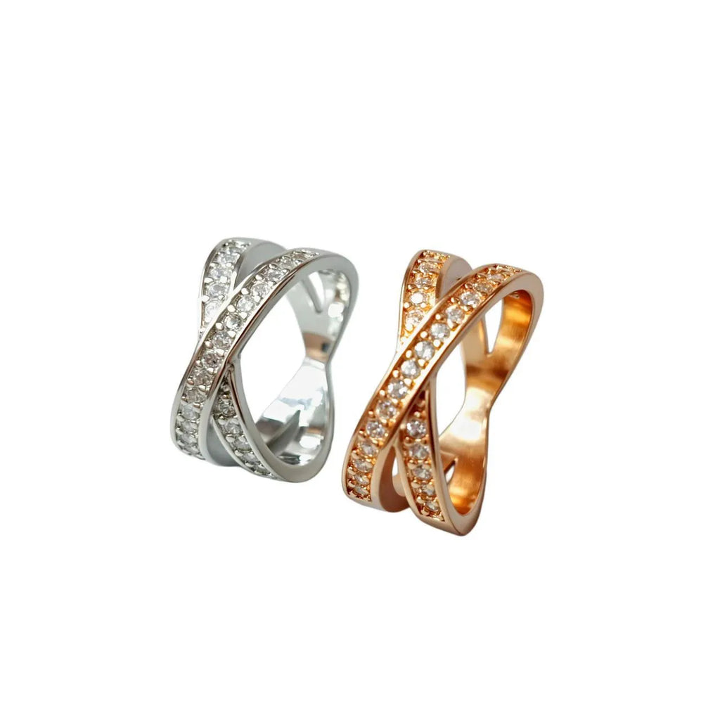 Silver or rose gold metal ring featuring a cross design with micro-inlaid zircon stones.