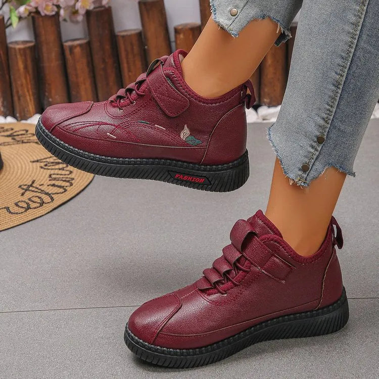 Women's black and red velvet cotton slippers with rubber soles showing hollow out design