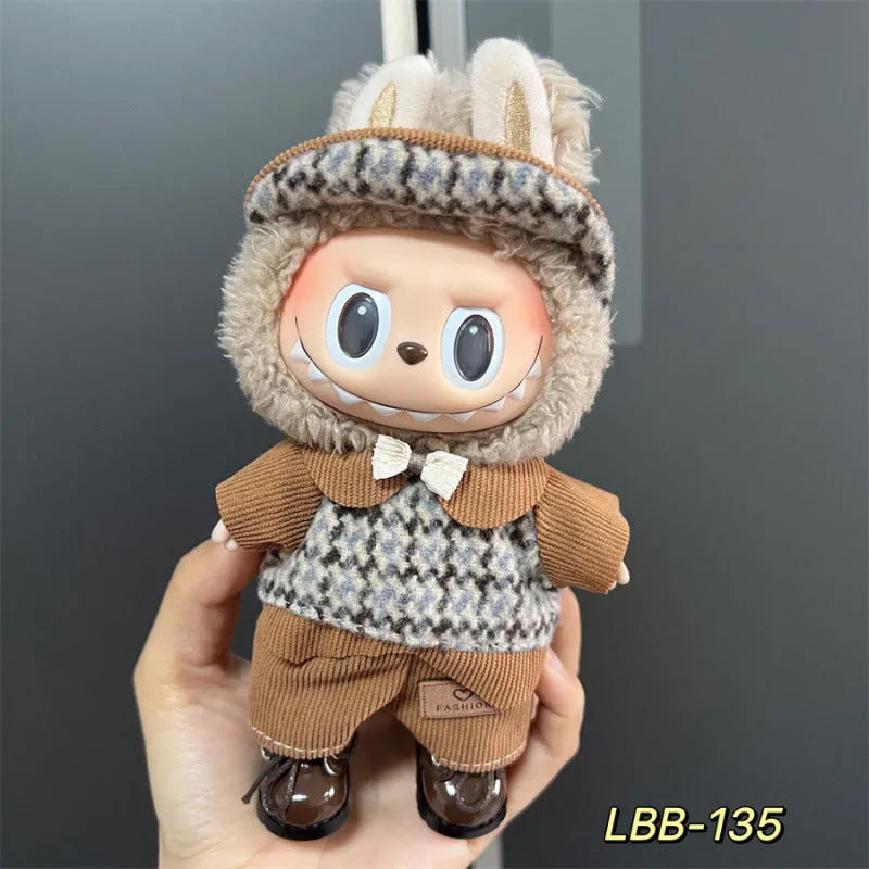 Plastic doll costume for a 17cm tall vinyl fashion figurine on a white background.