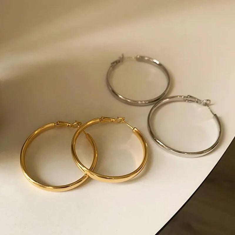 Gold and silver 40mm copper circle hoop earrings with electroplated finish