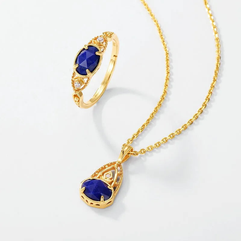 Geometric silver alloy ring with oval lapis lazuli stone in deep blue colour