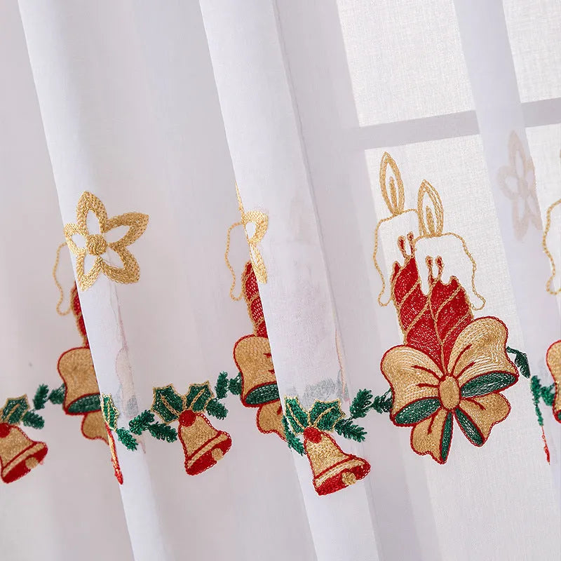 Pair of red and white Christmas curtains with embroidered snowflakes, showing semi-sunshade fabric.
