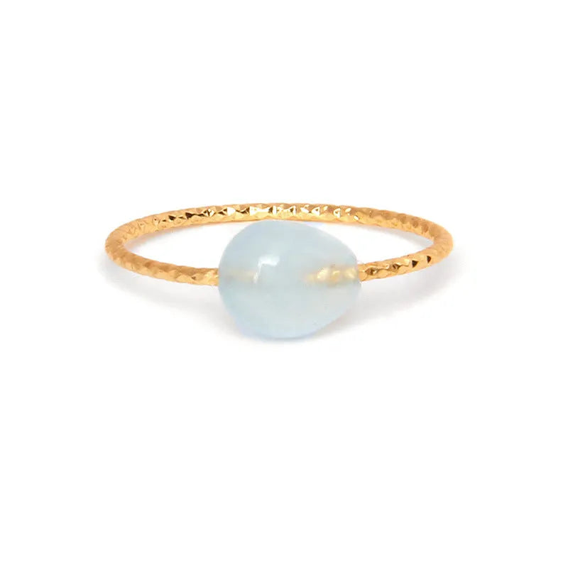 Geometric-shaped coloured agate ring for women with a polished stone finish, showing niche design details.