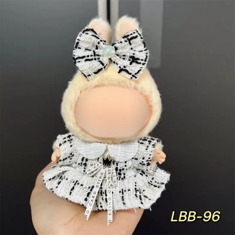 Plastic doll costume for a 17cm tall vinyl fashion figurine on a white background.