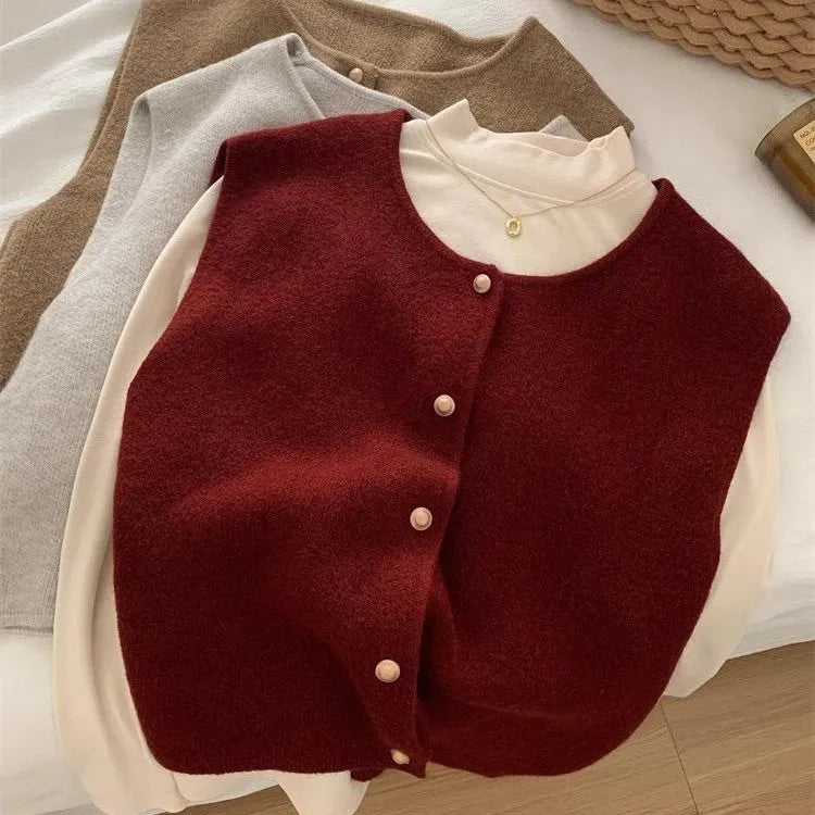 Women's grey V-neck polyester pullover vest with half-length sleeves laid flat