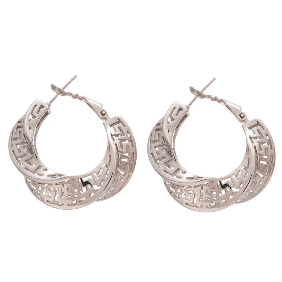 Women's twisted round geometric hollow stud earrings in silver or gold electroplated finish.