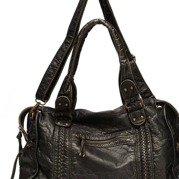 Women's brown retro motorcycle shoulder messenger bag with square shape and woven texture