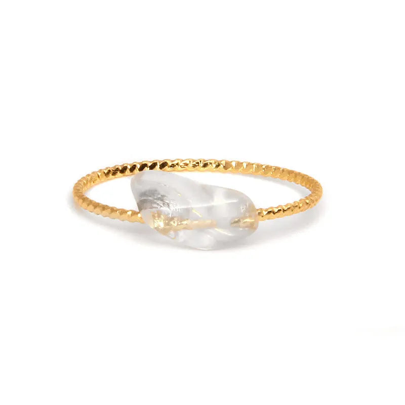 Geometric-shaped coloured agate ring for women with a polished stone finish, showing niche design details.