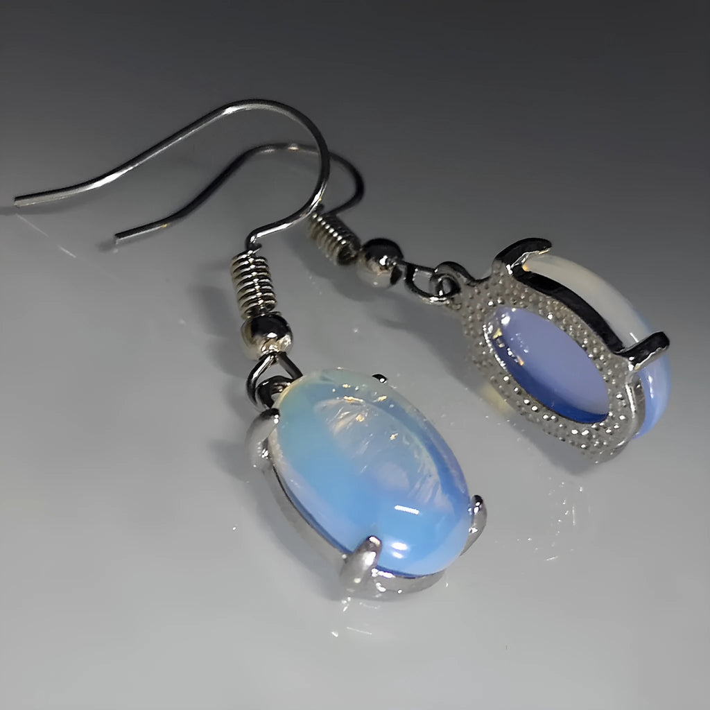 Opal earrings with retro moonstone cross design in drop shape and electroplated alloy construction