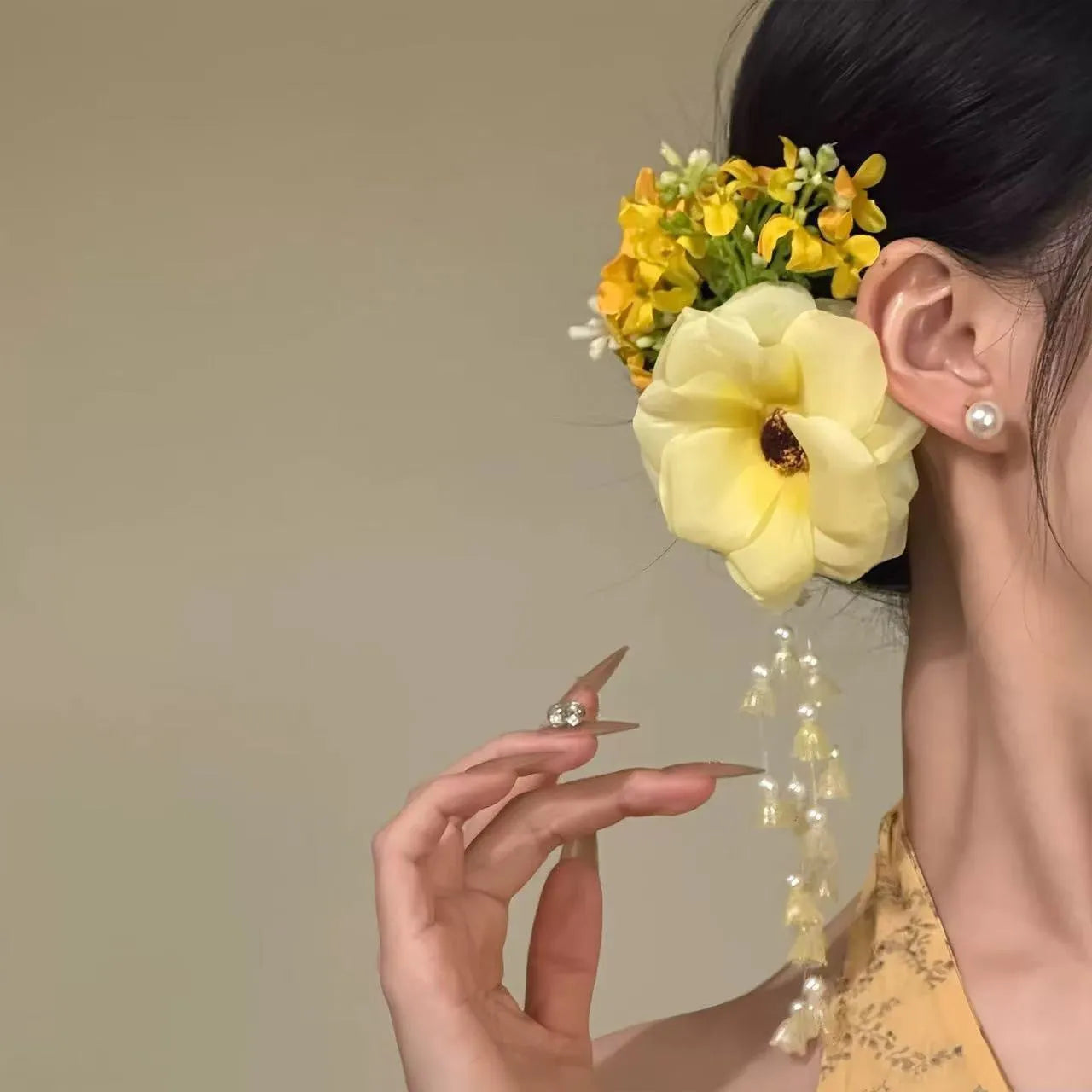 Handmade floral tassel hair clip with pearl detailing in purple or yellow colour option
