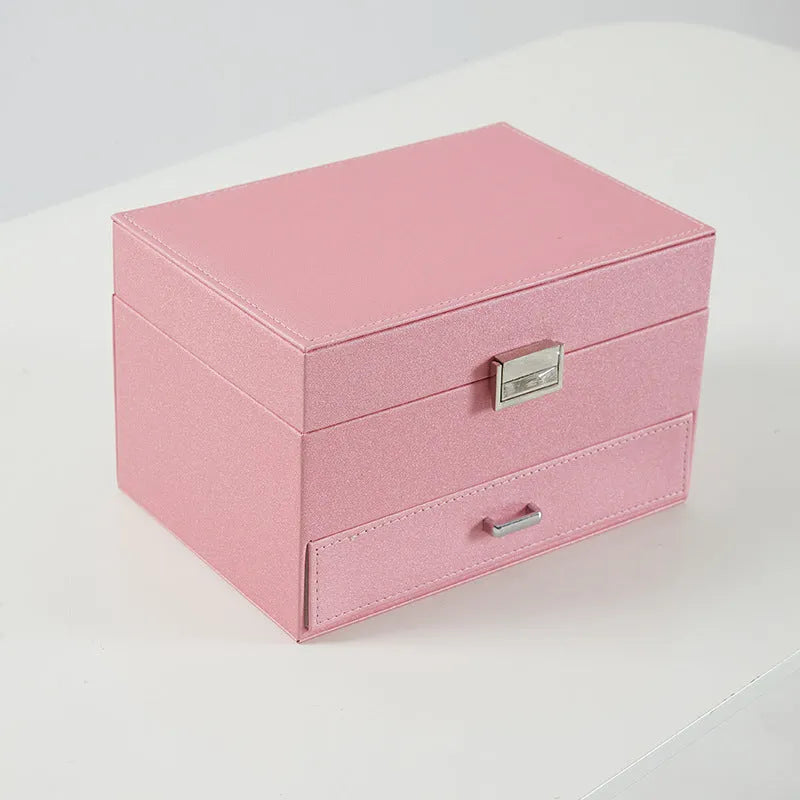 Hard-sided PU leather jewellery storage box in a solid colour.