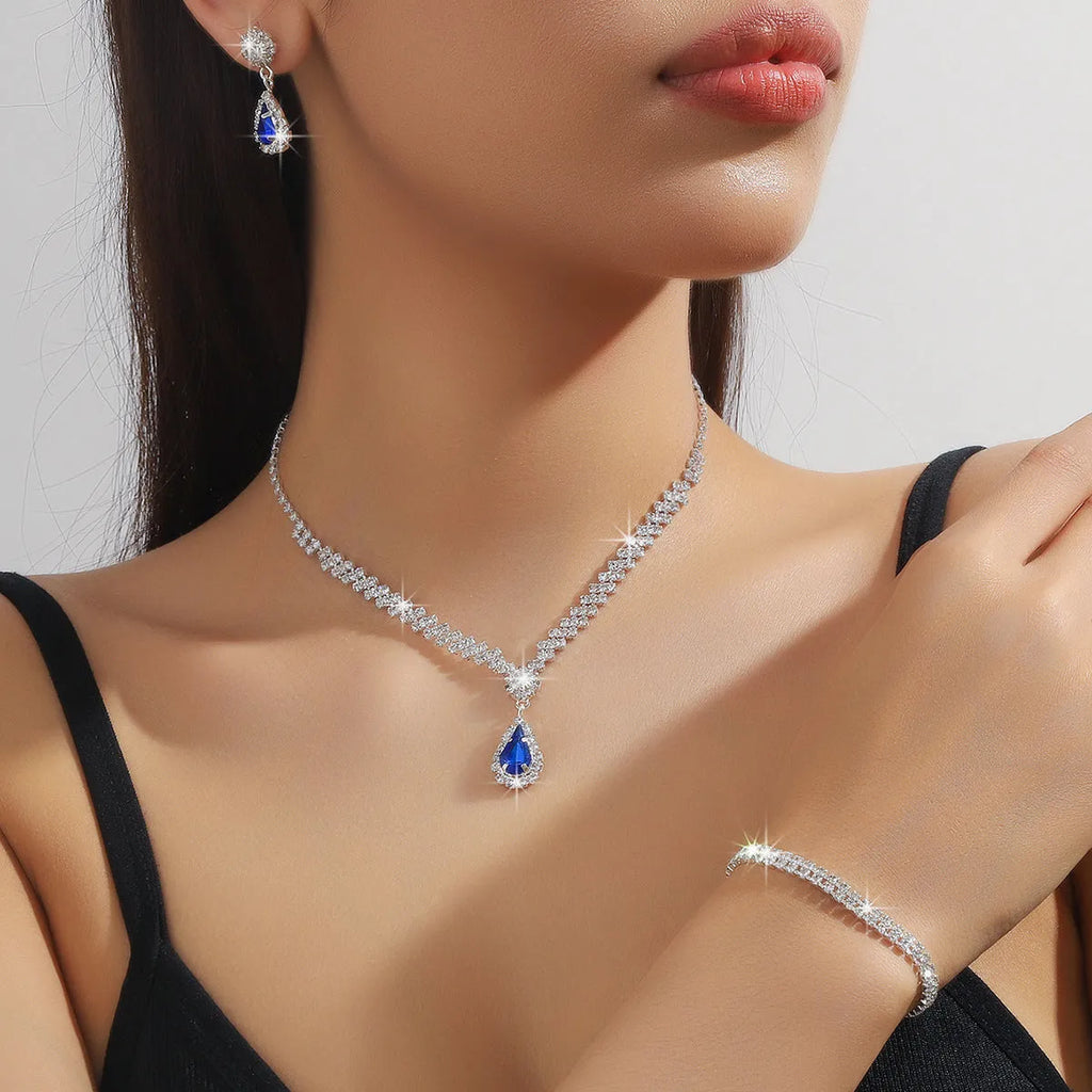 Women's claw chain necklace and earrings set with water drop rhinestones in blue colour option