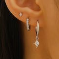 Geometric triangle and rhombus zircon earrings in gold and silver with stud, pendant, and clip styles