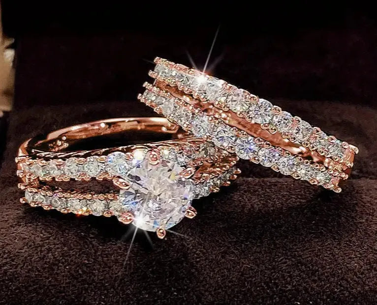 Women's 2-in-1 fully jewelled ring set in geometric design with round elements, shown in gold, rose gold, and silver finishes