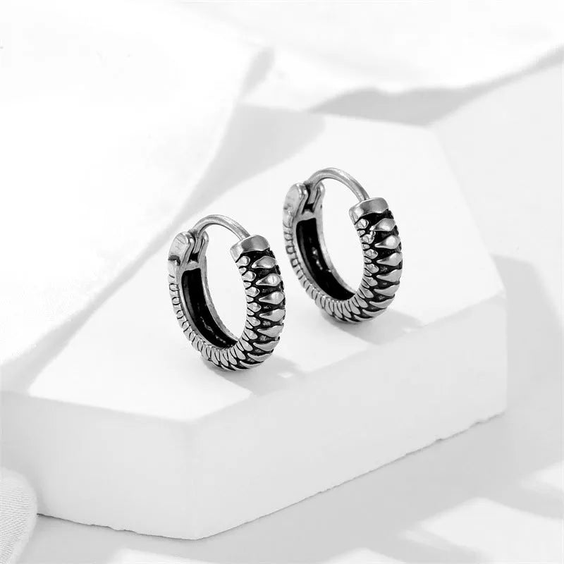Geometric titanium steel retro twist earrings with stripe pattern in silver colour