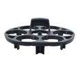 Black plastic egg holder basket on a kitchen countertop, showing its 13.8 cm length and retainer design.