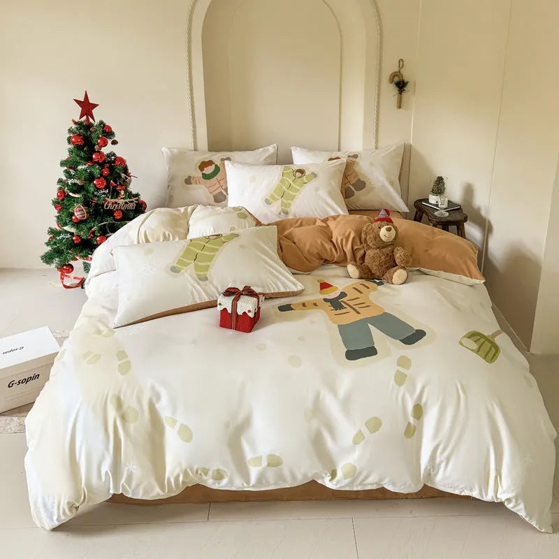 Cartoon printed super soft washed cotton chemical fibre four-piece bedding set on a bed.