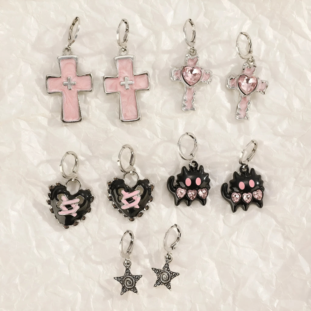 Women's alloy cross crystal earrings in white, bright black, and antique silver colours with geometric animal designs