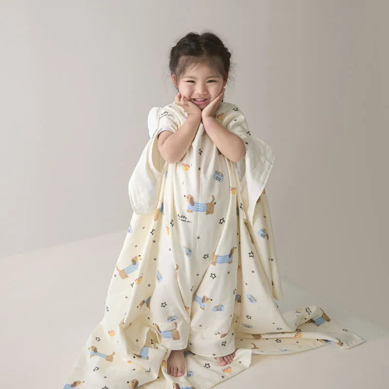 Anti-kick sleeping bag blanket in a colourful Cloud Bear Star Dream design on a bed.