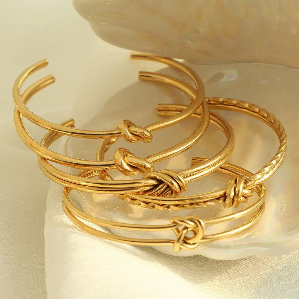 Adjustable stainless steel bracelet with knotted double-layer design in gold plating
