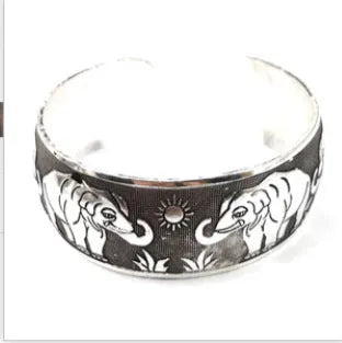 Ethnic carved open Miao silver bracelet in Roman style alloy construction