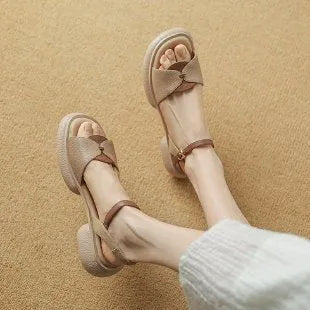 Women's khaki platform sandals with a chunky heel and open toe.