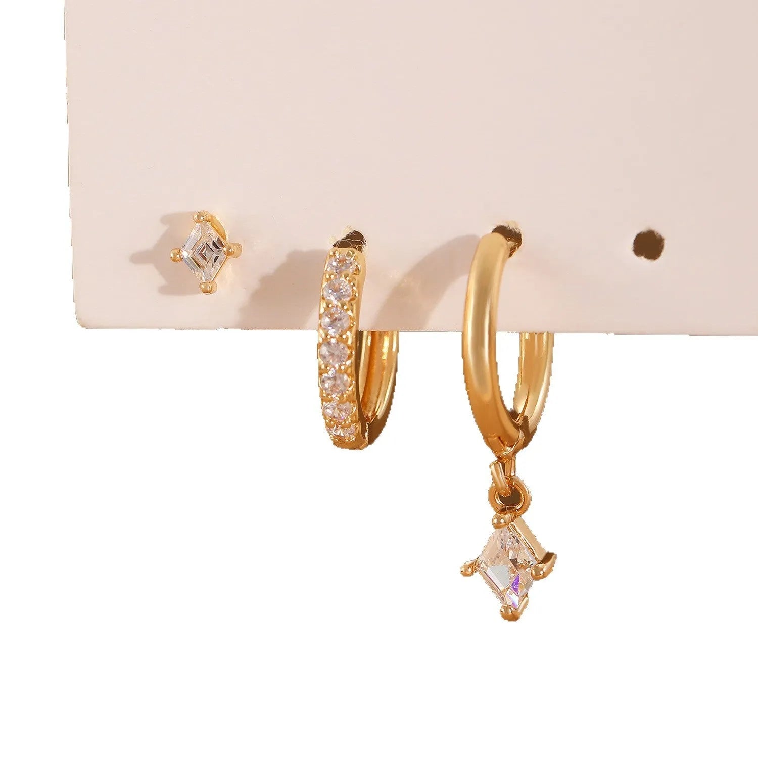 Geometric triangle and rhombus zircon earrings in gold and silver with stud, pendant, and clip styles