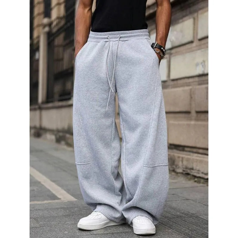 Men's straight-leg high waist casual trousers in a cropped length, shown in a dark grey colour.