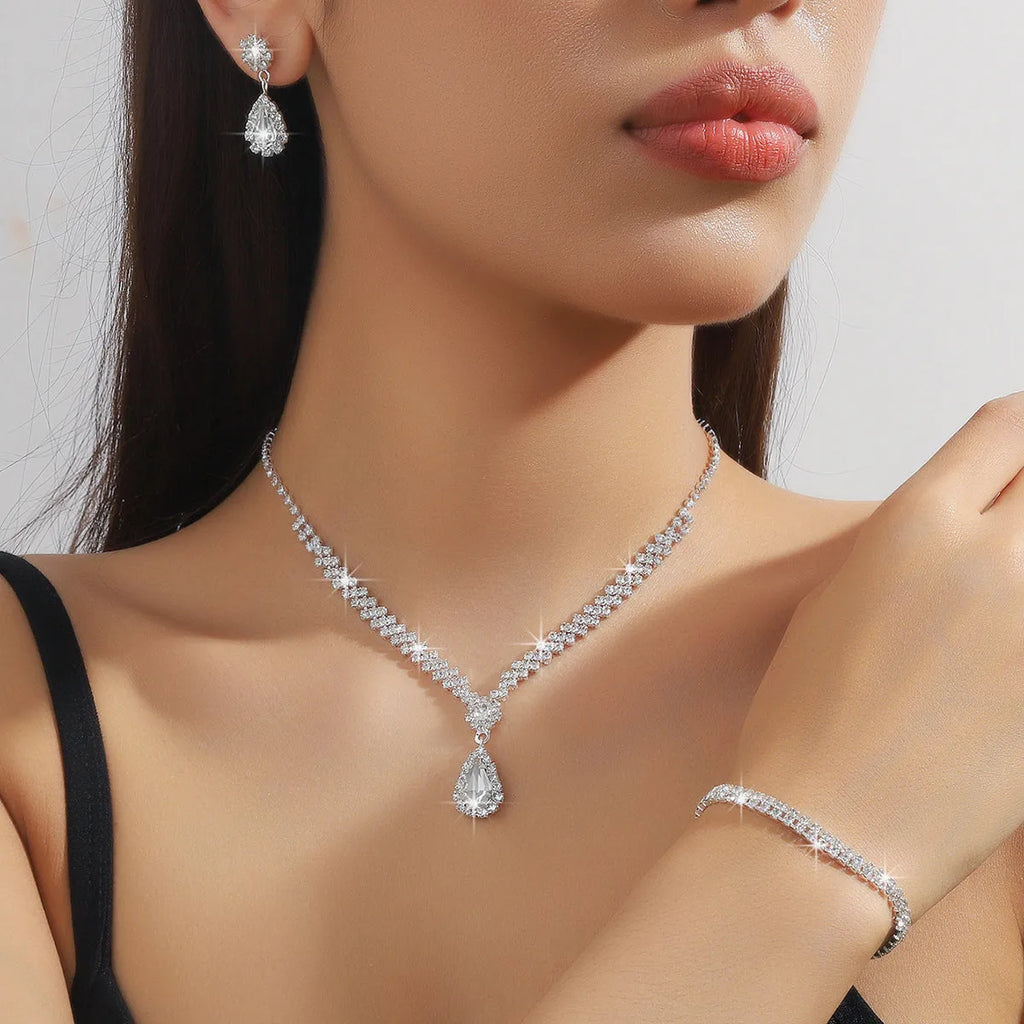 Women's claw chain necklace and earrings set with water drop rhinestones in blue colour option
