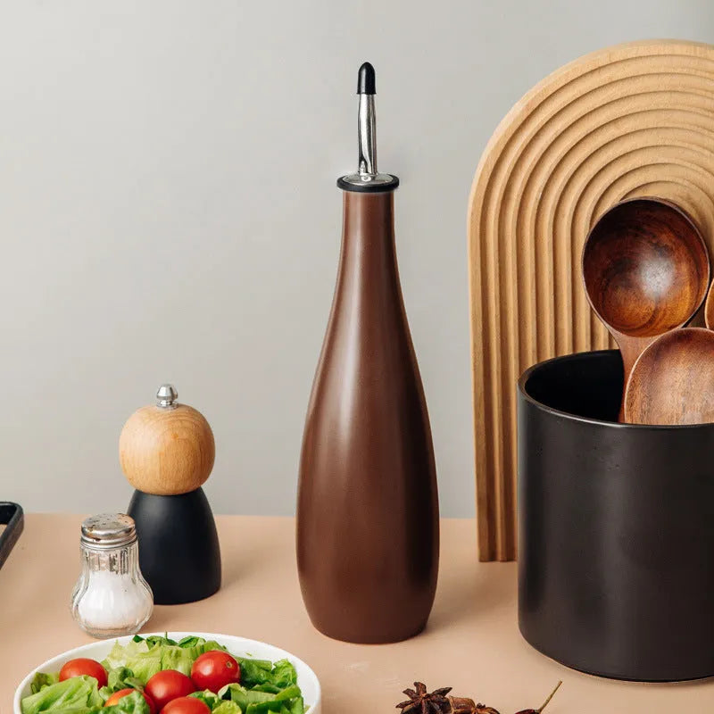 Ceramic kitchen oil pot with funnel and oil brush in 650ml capacity