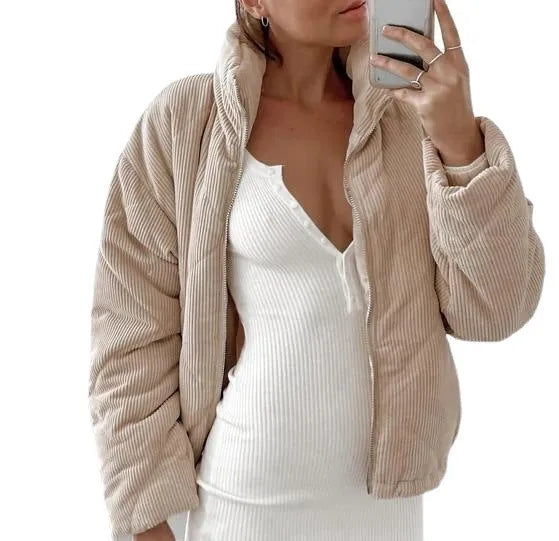 Women's apricot-coloured corduroy jacket with a stand collar, long sleeves, and a front zip.