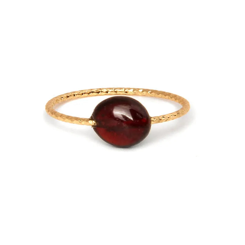 Geometric-shaped coloured agate ring for women with a polished stone finish, showing niche design details.